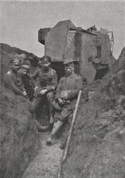German infantrymen of the 27th Infantry Regiment pose with a tipped-over French Schneider CA1 tank near Laffaux, May 1917.