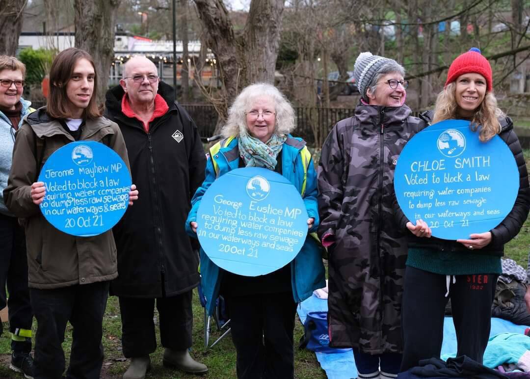 💧DIRTY WATER CAMPAIGN 

🪧 Today Rebels from XR Norwich joined a UK wide day of action unveiling a blue plaque . This was to shine a light on our local MP,  who didn't vote in favour of an Amendment which would have protected our waterways.  

#DirtyWater
#VoteCleanWater