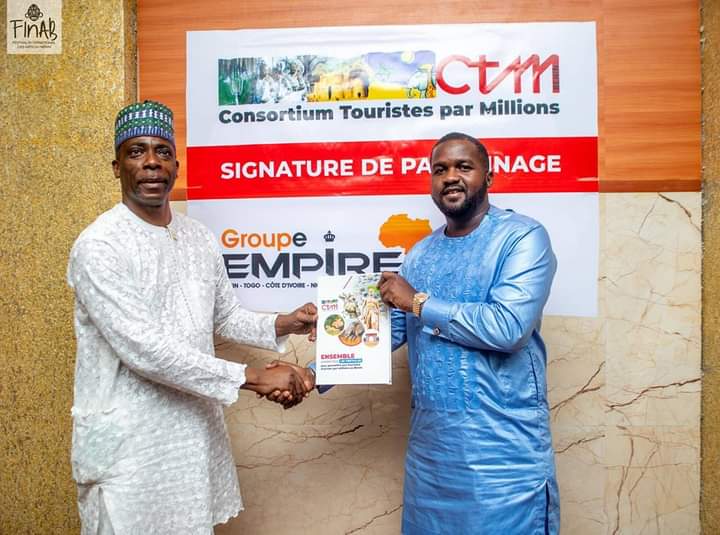 ctmbenin1's tweet photo. Our President, Amb. Dine BOURAIMA on behalf of CTM-Benin signed a partnership MoU with the Founder of Empire Group, Mr. Ulrich ADJOVI yesterday in Cotonou as the y host  the International Festival of  Benin Arts  (FInAB) from 14th-19th Feb. 2023  in Cotonou. @PatriceTalonPR @ATB https://t.co/hPsLUYzHIc