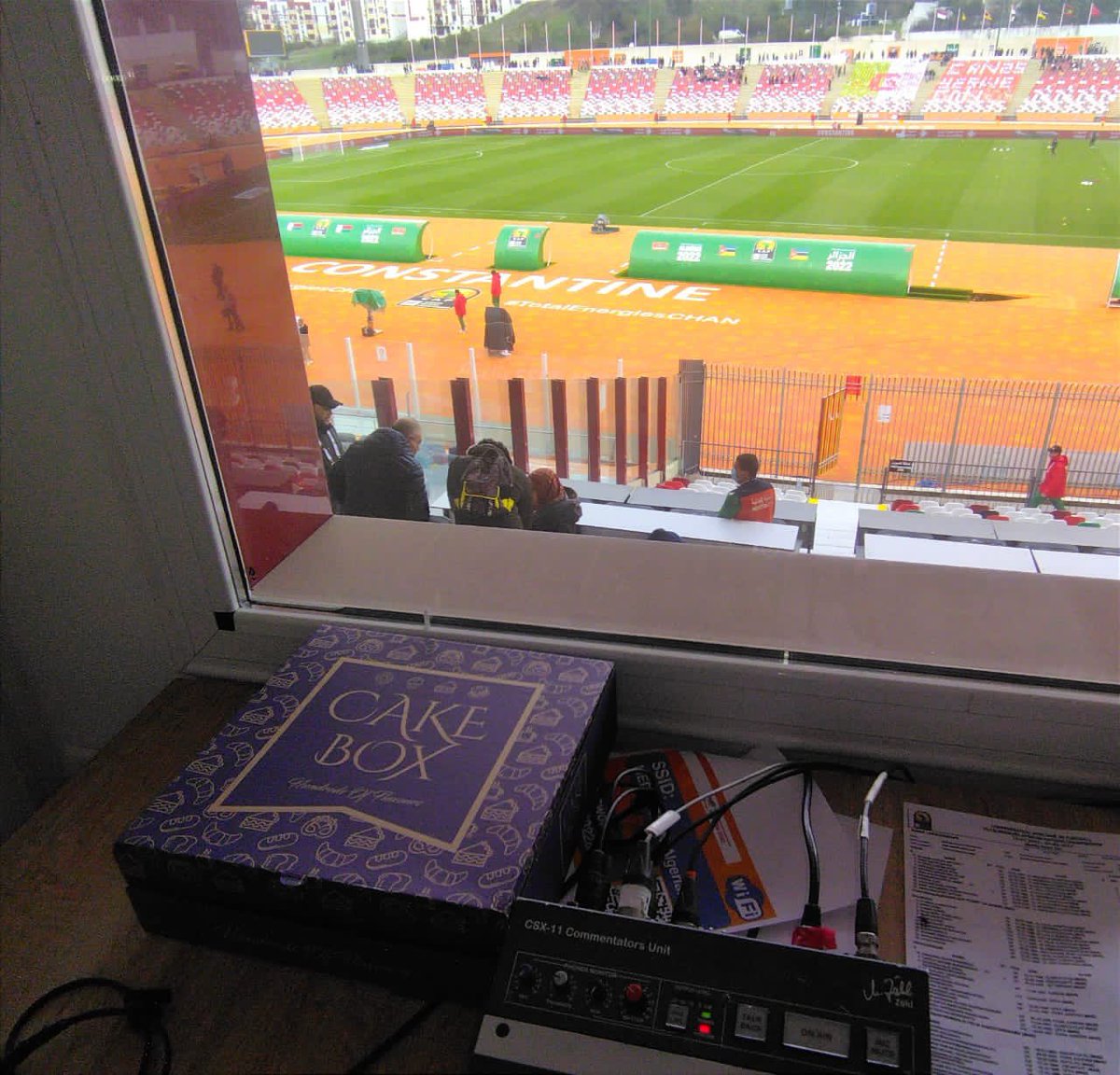 jermaine_egesa's tweet photo. Touchdown and see what was awaiting me in the commentary booth🥹! 
#TotalEnergiesCHAN2022 
🇲🇬 vs 🇲🇿

#Chan2022KuSanyukaPrime 
#JToTheWorld https://t.co/YkSkplbdlp