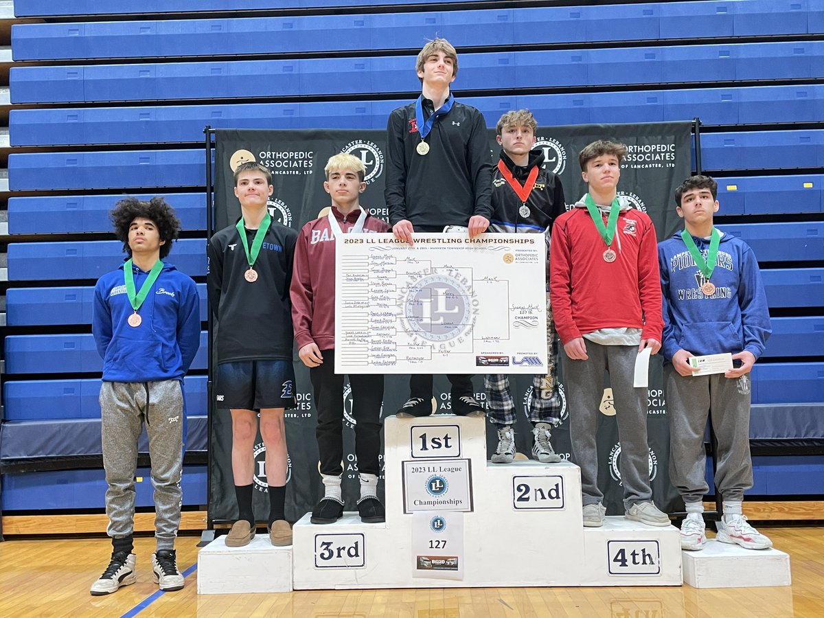 <a href="/OrthoAssocLanca/">OAL</a> League wrestling championships 127 lb sponsored by Ned Bard &amp; Son Trucking, atop the podium is champion Seamus Mack of Hempfield