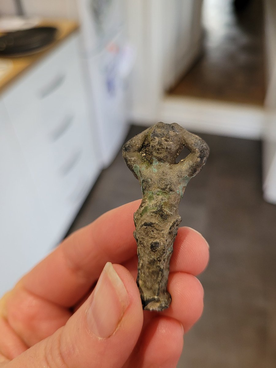 Anyone know what this is? It's heavy, maybe lead? My son found it in a  wall?...