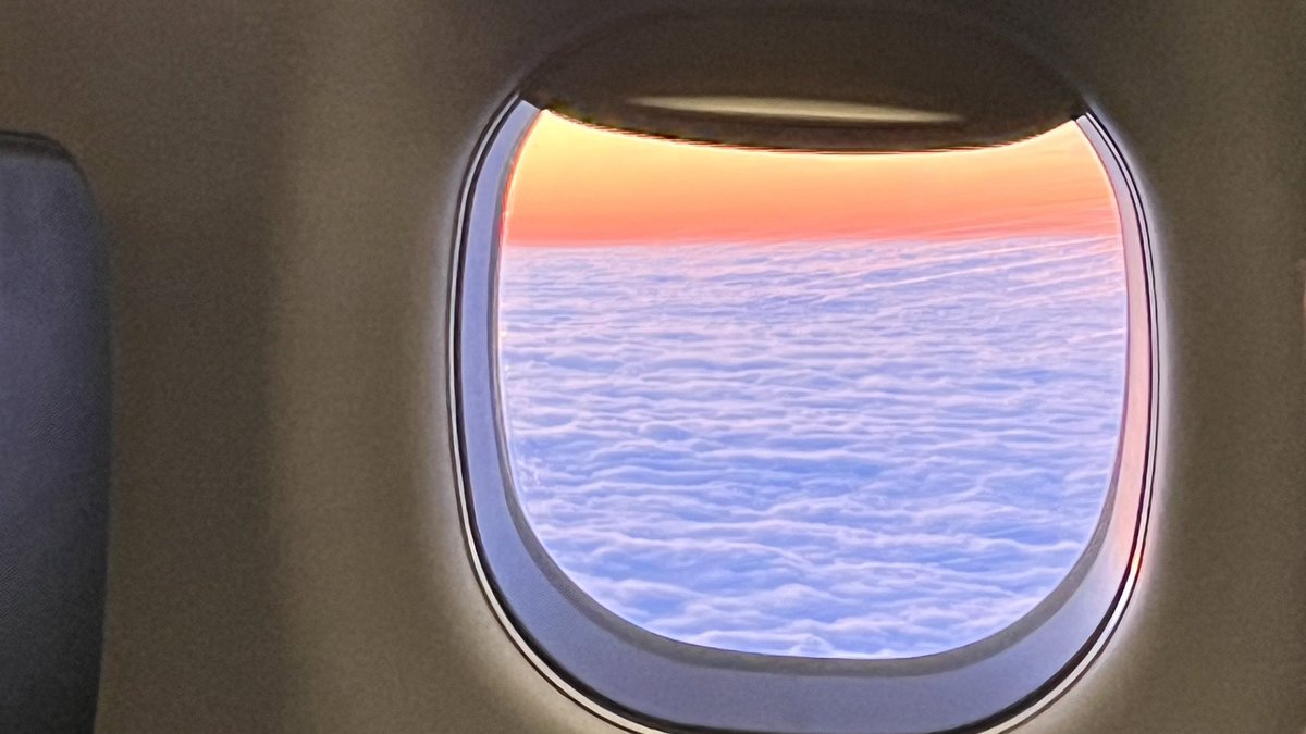 chazingamber's tweet image. The bright side of a 2hr delay last night from ATW to ORD was catching a beautiful #sunset .  Thanks to @AmericanAir FA Karely Ramirez for taking a moment to enjoy the view with me and for the great service! #viewfromthewindow #travelbadass #execplat