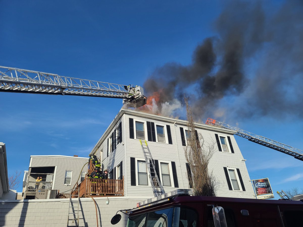 BostonFire's tweet photo. Companies working at a 2 alarm fire at 141 P st. South Boston. Fire o floors 2,3 and thru the roof. Of a 3 story mixed occupancy building. https://t.co/uTDI85pG62