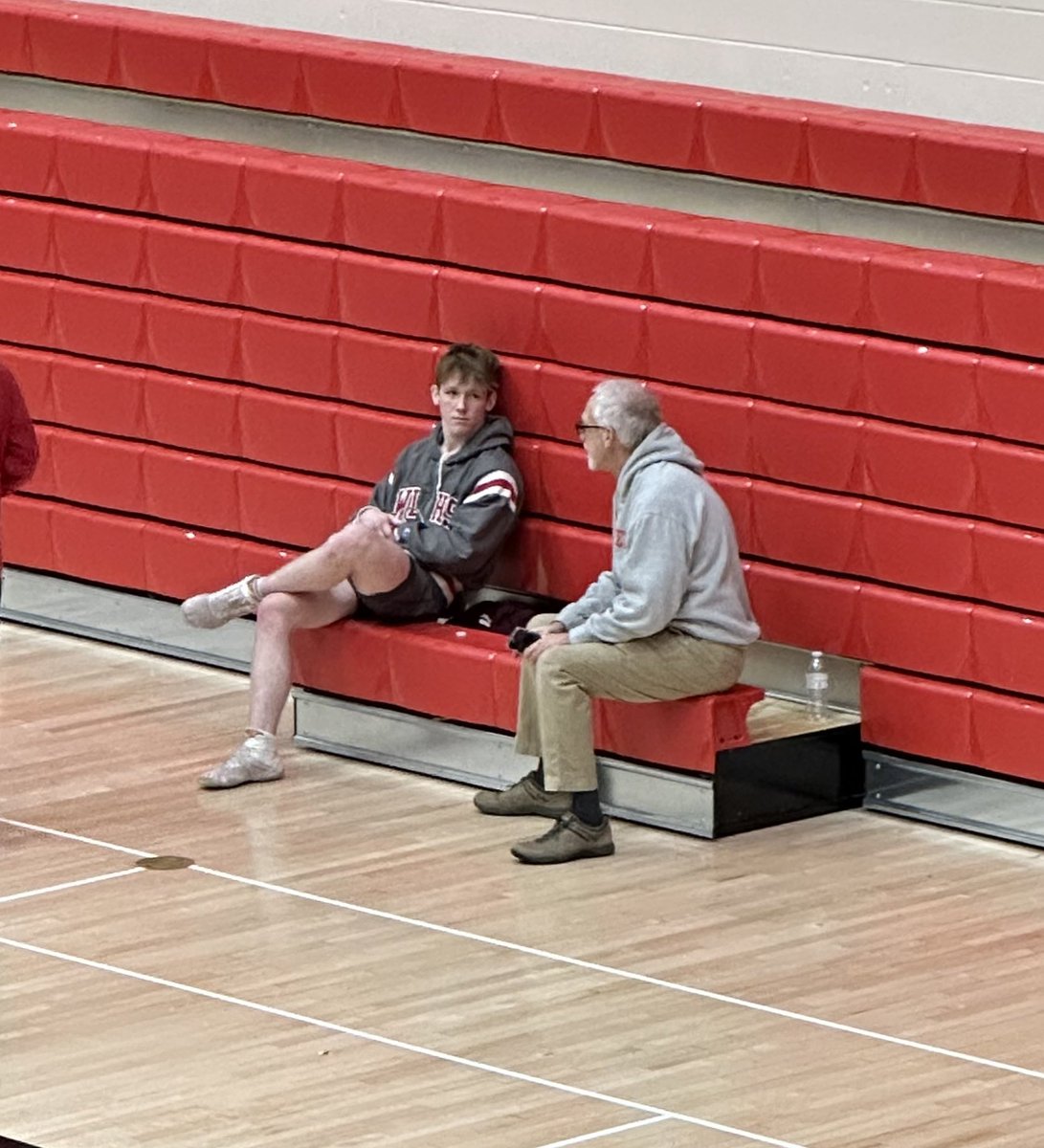 Will Sautter getting some pre-match advice from Principal Ron Shriner.