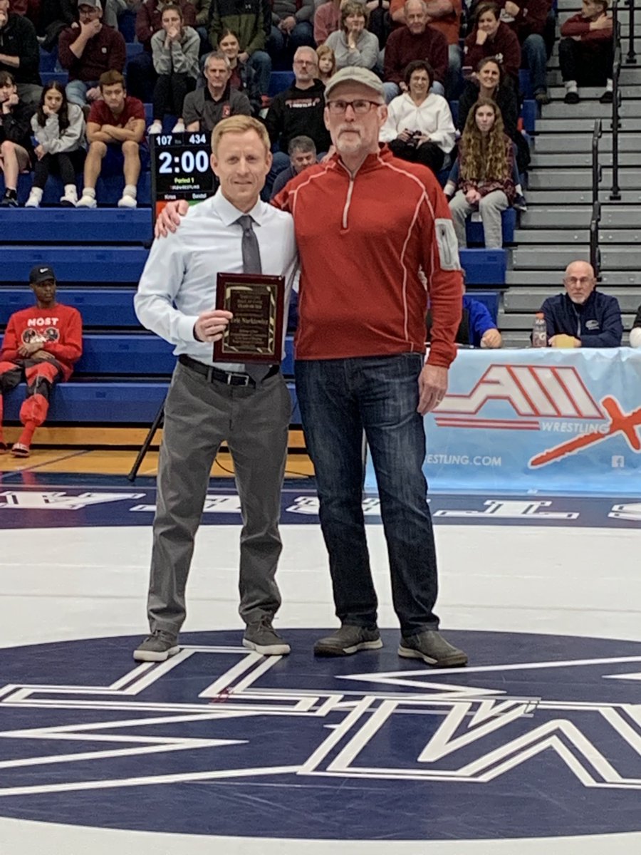 Congrats to former Warwick star wrestler Eric Narkiewicz (left) on his induction into the L-L League Wrestling Coaches Association Hall of game. Presenting Eric his plaque is his father Joe, a fellow Hall of Famer. ⁦<a href="/WarwickWarriors/">WarwickAthletics</a>⁩