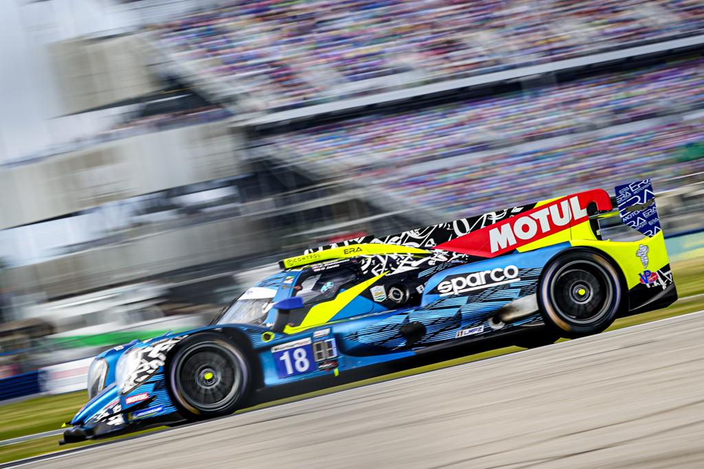 EraMotorsport's tweet photo. Just over two hours into the Rolex 24 at Daytona! So far, so good, as we're slowly chipping away at the field. Ryan is in the car and gaining time on the competition, and we're up from eighth to seventh in class. Less than 22 hours to go!

#IMSA #Rolex24 #Daytona https://t.co/BUYuA0K5Ab