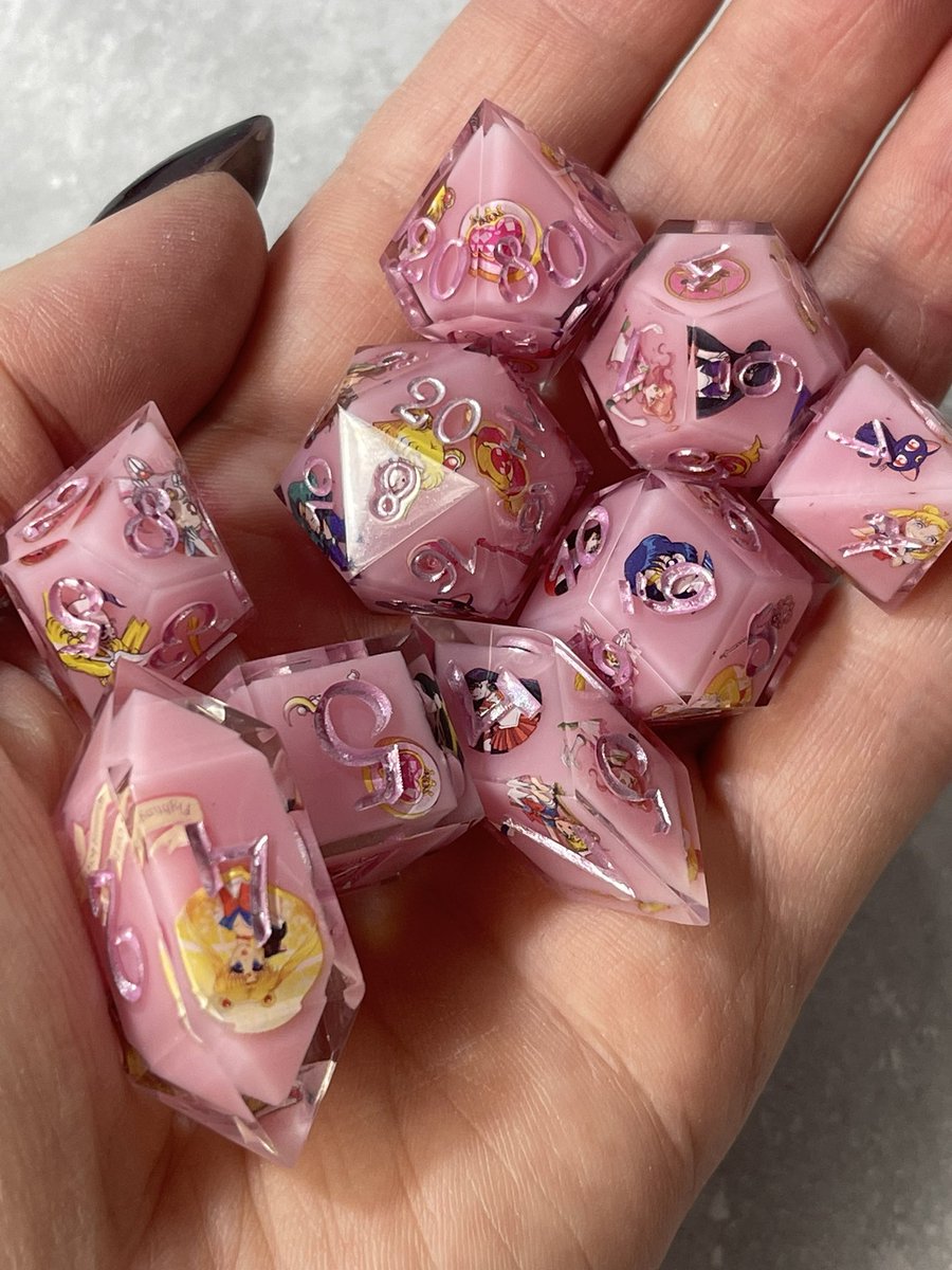 MageStudio's tweet photo. Sailo Moon dice set and single D20s are now available in my shop!
https://t.co/g3XpNROj7O
#sailormoon #sailormoondice #sailprmoonart #dice #d20 #handmadedice #dnd #dungeonsanddragons #rpg #tabletop #dnd5e #resin #resinart #diceart #kości #erpegi #dnddice https://t.co/GxgrZl4aSW