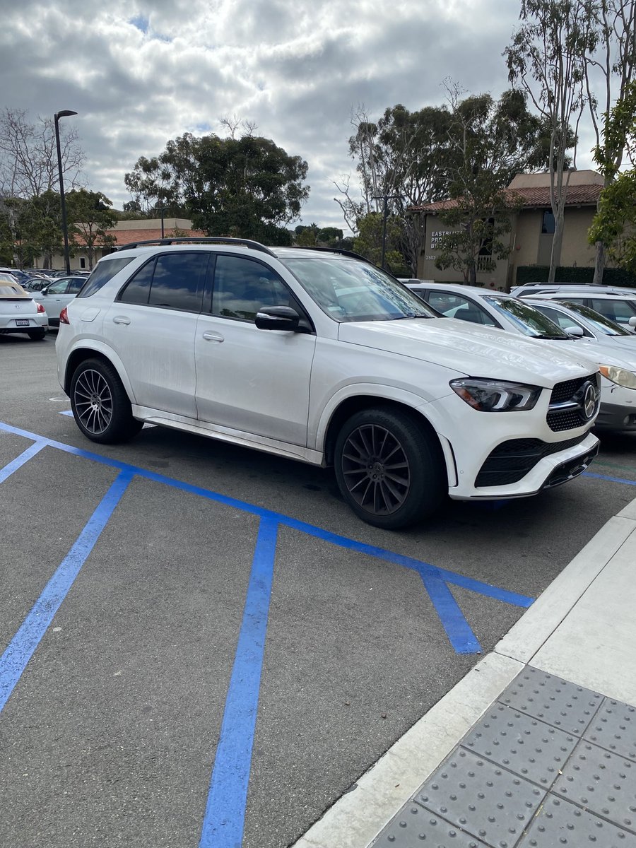 DrJustinWest's tweet photo. If you have a blue hang tag use it. If not, stay out of the handicap spaces. My 5 year old can’t walk.Thank you for the exercise I got carrying him through the parking lot past your car.  ⁦⁦@NewportBeachPD⁩ has better things to do than remind people to act honorably. https://t.co/IAu2Hb3lC3
