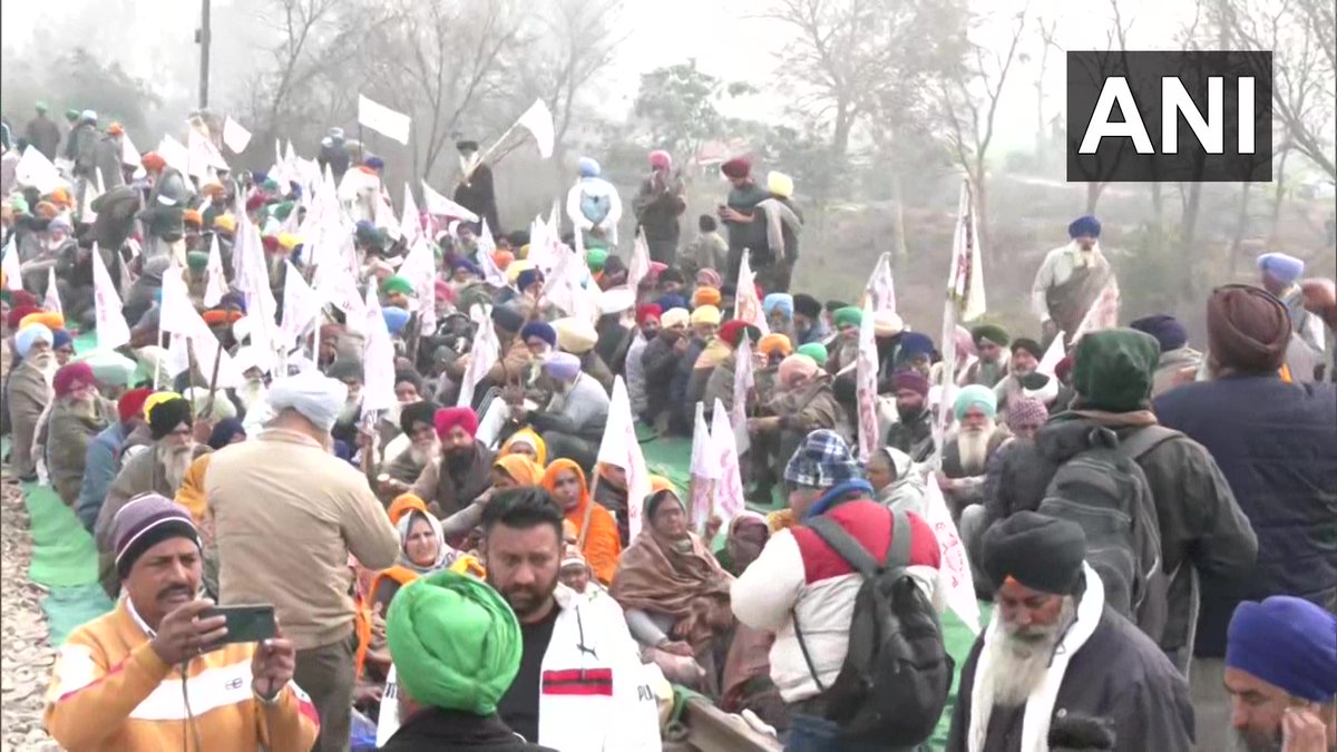 ANI's tweet photo. Amritsar | Members of Kisan Mazdoor Sangharsh Committee holds 'Rail Roko' protest stopping the movement of trains for 3 hours in Punjab from 12 noon to 3 pm as they allege that their demands were not accepted and the promises made by the government were not fulfilled. https://t.co/BNeQjFnlxE