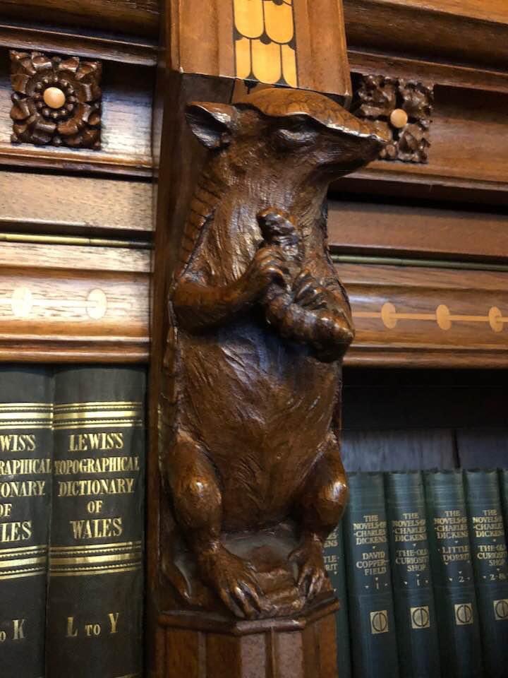 Don’t you feel that the world is a better place for a carved armadillo clutching a bookworm? #CardiffCastle