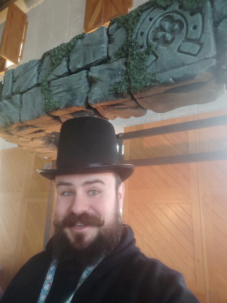 dakotairishIE's tweet photo. Your friendly neighborhood dice salesman ready for duty at the final day of @WARPCON 🎩🧙♂️ #warpcon #ttrpg https://t.co/aKE0EMnPj0