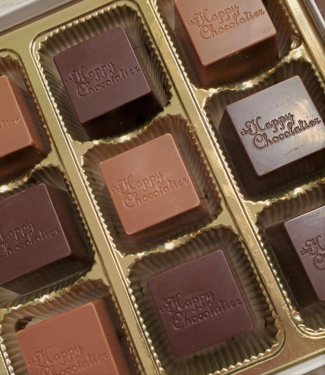 What's inside those little packages of happiness? Milk &amp; dark chocolate truffles in a variety of flavors like PB, orange, raspberry, mint, cappuccino, sea salt &amp; more! thehappychocolatier.com

#valentinesday #spreadchocolatehappiness #chocolate #valentine #chocolatetruffles