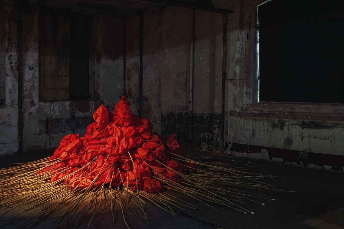 BeaLast's tweet photo. Artist #BeaLast The Red Bags 2022 #sculpturaldrawing #contemporaryart #artinstallation reclaimed waterproof canvas/Bullet Holes/Bamboo @Cluster_London @OxoTowerWharf Nov 22. https://t.co/qOuQeud2Eh https://t.co/cawAvQ3UDP
