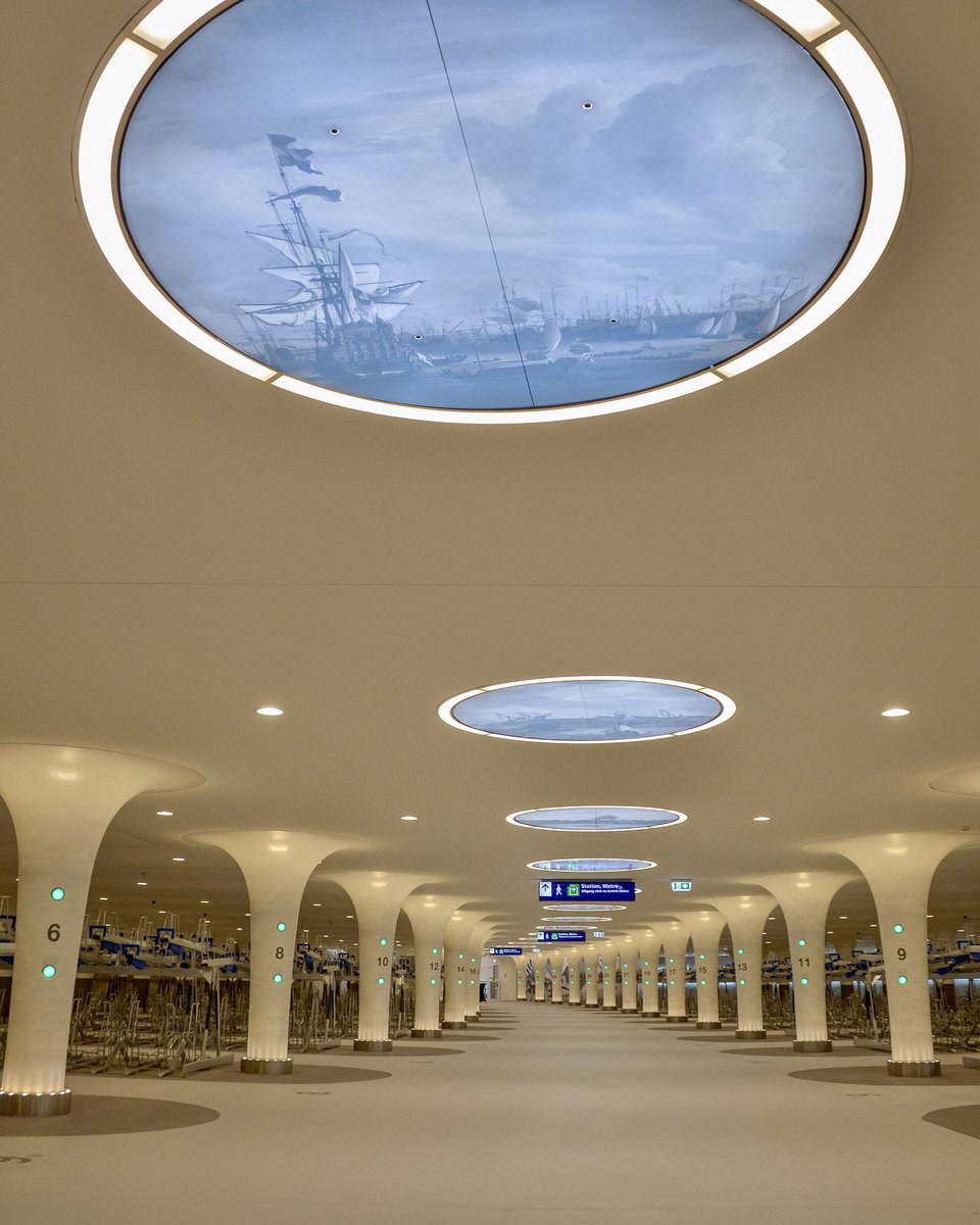 Cycling_Embassy's tweet photo. This week @AmsterdamNL Central Station opened a new bike parking facility, which was not built on or underground but underwater.

As city's largest such facility, the Stationsplein bike garage was built under the Open Havenfront and can store 7,000 bikes.

https://t.co/CxOSk42UXO https://t.co/TEeXrQ4TEg