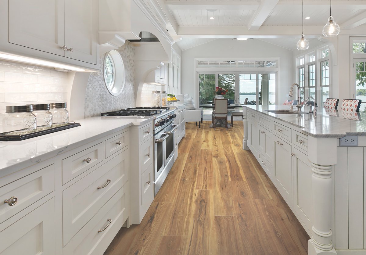 MohawkFlooring's tweet image. The heart of your home is the #kitchen, and it&apos;s important that your floors are beautiful, but highly functional. Our #SignatureTechnology makes #RevWoodPremier beautiful, durable and #waterproof.

RevWood Premier Morena Bluffs in Sunbathed Pecan
See More: bit.ly/3D56yGZ