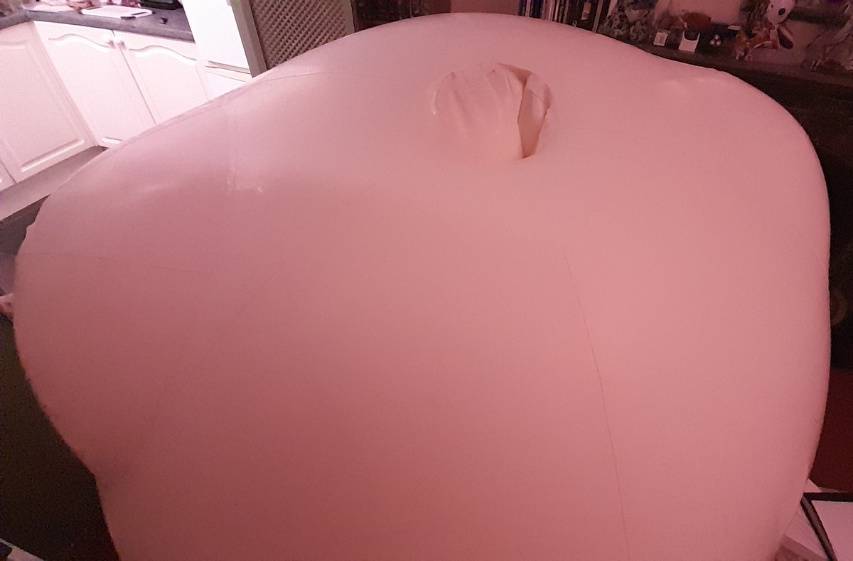 In regards the many questions I've had on the subject, yes this is a massive inflatable latex suit, it'd probably blow up a lot bigger than this too. It came custom made to my design from <a href="/glan_zig/">GlanZig</a>, so drop them a message and see if they'll do you one too.