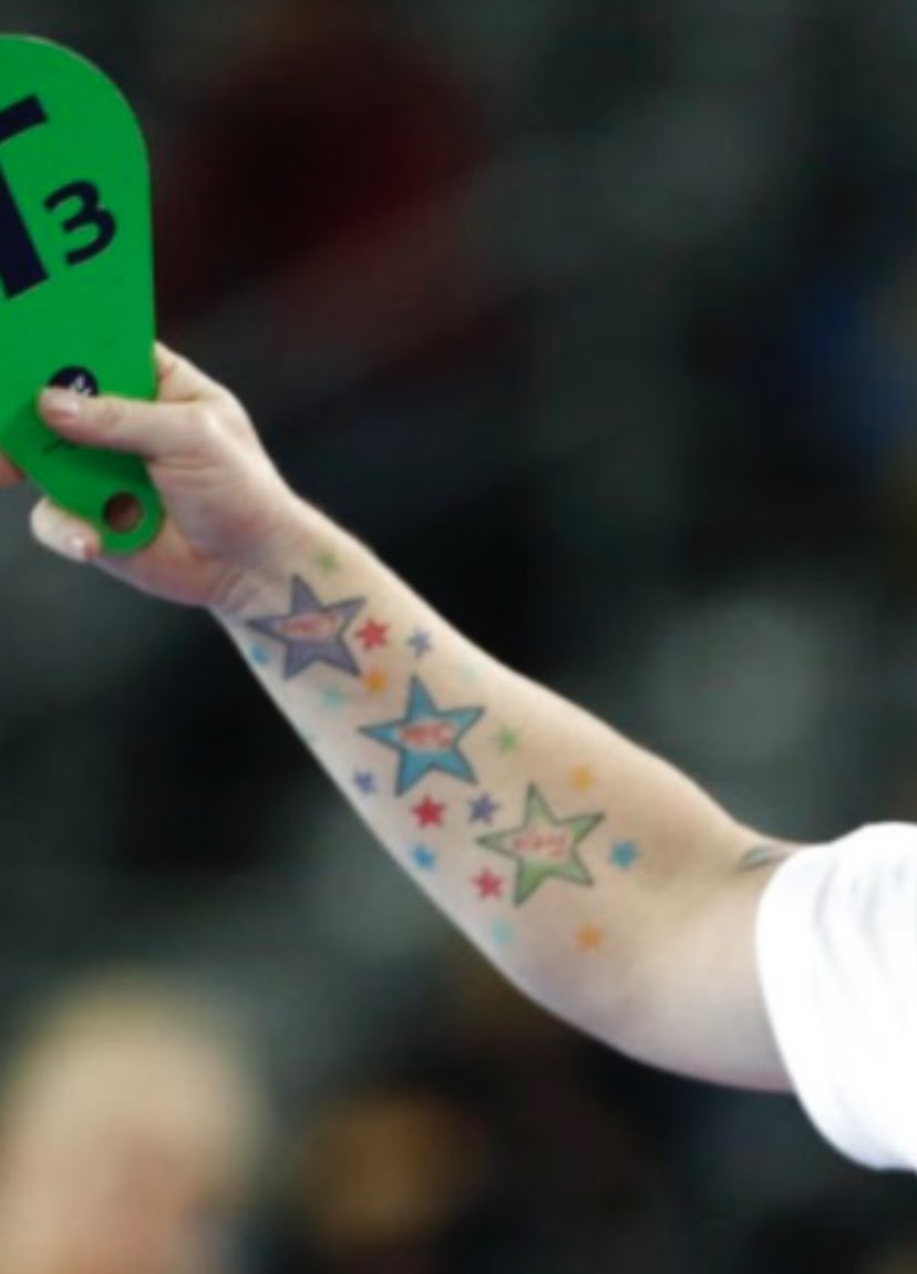 Montenegro's Ana Radovic sports a tattoo during the women's handball  preliminary match against Russia at the 2012 Summer Olympics, Sunday, Aug.  5, 2012, in London. (AP Photo/Matthias Schrader Stock Photo - Alamy