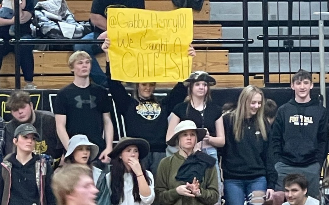 If your Paint Valley child is pictured here you should honestly have a conversation about bullying and harassement!! Not only did they hold this sign about my daughter during the Varsity basketball game, they also walked by her cheering saying stuff to her. @PVLocalSchools