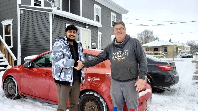RebeccaZandberg's tweet photo. Need a story to cleanse your feed? This is Chris Delargy of Mount Brydges, Ont., on the right. He just sold his 2011 Mazda 3 to Sandip Adhikari (left) and his three roommates. 1/ #ldnont https://t.co/K9V36jqan8