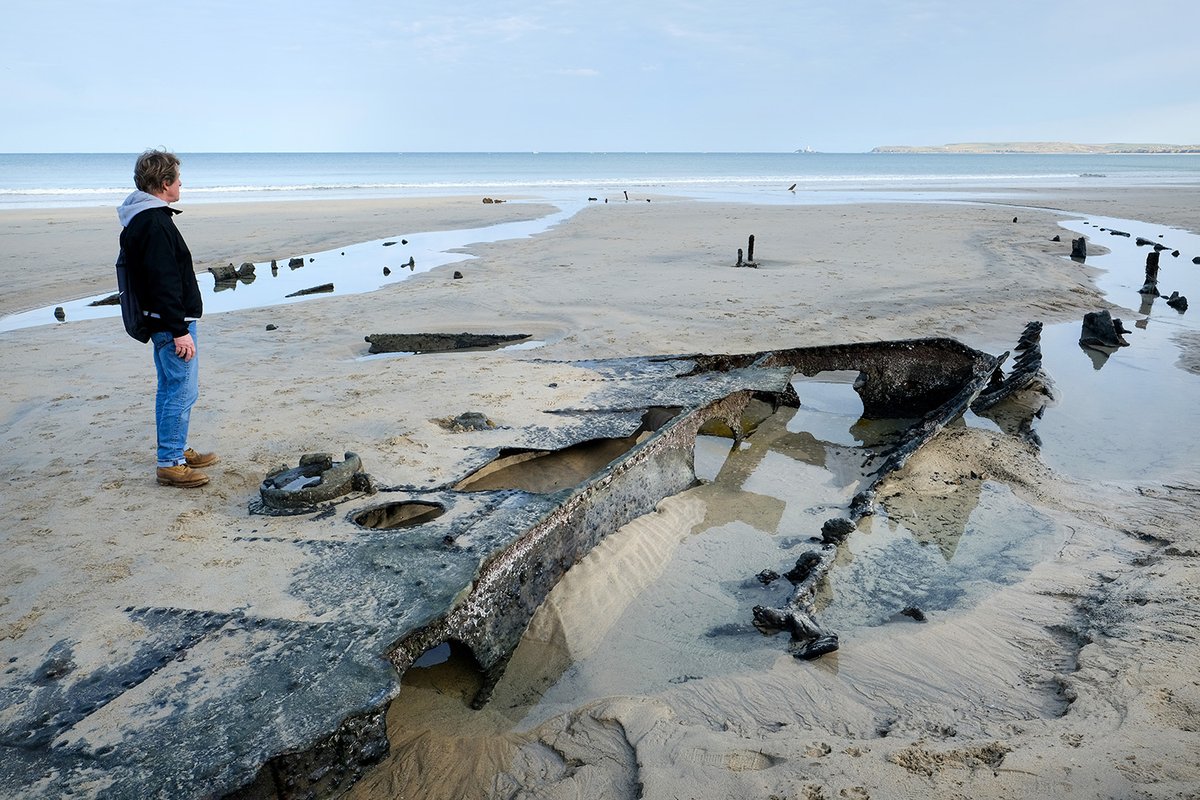 photogregmartin's tweet photo. Recent storms followed by big spring tides have uncovered three Victorian shipwrecks at the same beach. Iron steamships Cintra, Vulture and Bessie were all wrecked at Carbis Bay during a fierce storm 130 years ago, and are normally hidden beneath the sand. https://t.co/RICXM3Etig https://t.co/qmU3lkWGCI
