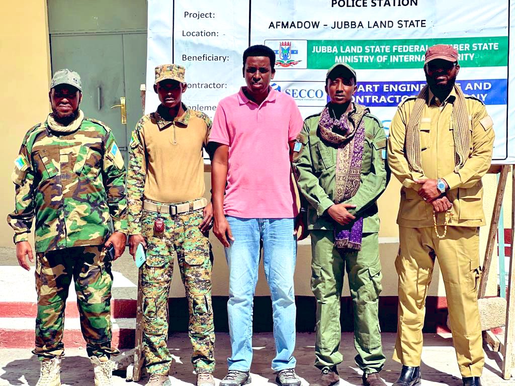 UNOPS_Somalia's tweet photo. The newly built police station in #Afmadow, #Jubaland State, has been officially handed over to @MOIJS_somalia, adding to the 9 successful PS deliveries under #JPP. A major milestone for the community towards a safer Somalia.Endorsed by: @EU_in_Somalia @UKinSomalia @GermanyinSOM https://t.co/OVDr3NFwEV