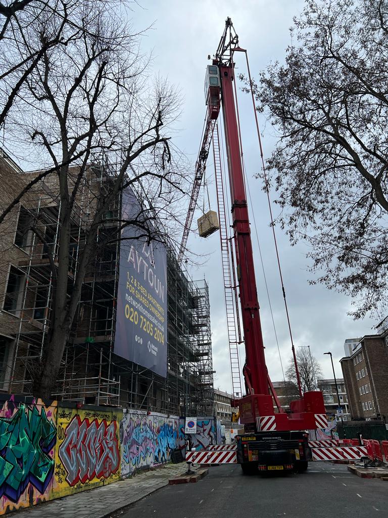 Following the redesign of the original energy strategy for our Aytoun Road project for @networkhomesuk  Homes, last week the team crane lifted solar panels and air source heat pumps to the roof of the new building. 
#renewableenergy #residential #development #Sustainability