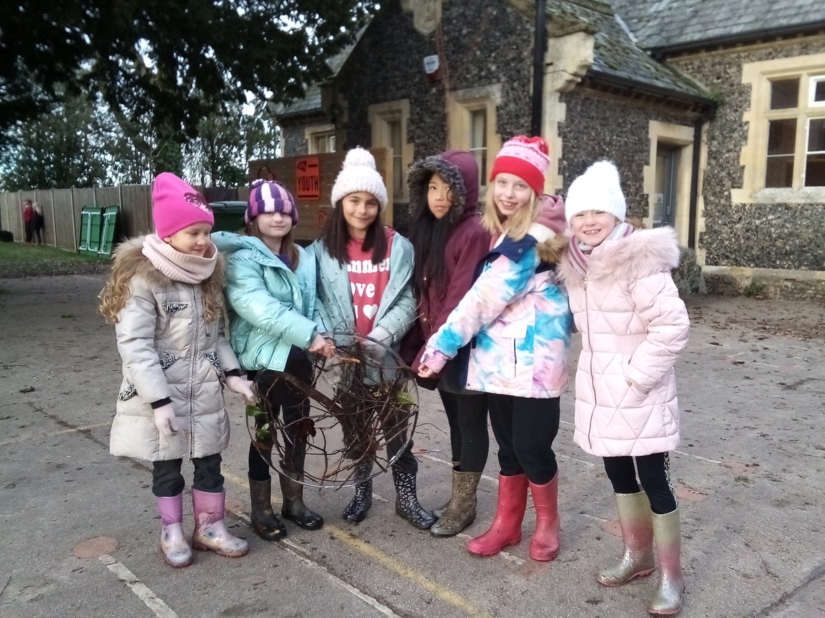 Frozen art in OPAL (Outdoor Play And Learning) plus some very well wrapped up pupils!