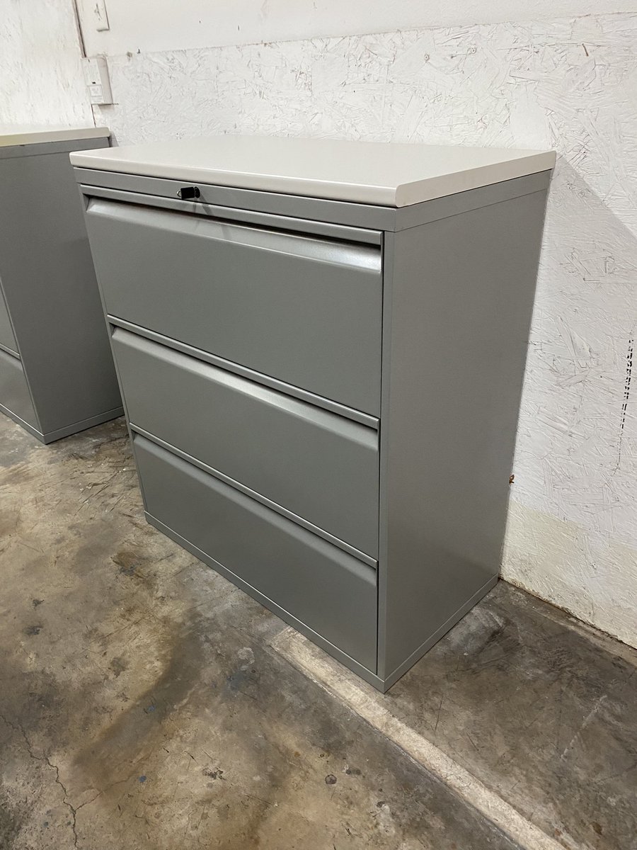 DFSIHOUSTON's tweet image. Knoll 3 drawer lateral file cabinets, commercial grade, heavy duty, metal in silver finish, laminate top, file hanging frames, fit letter or legal size files, lock with key, dimensions: 36” wide x 18” deep x 40” height #knoll #filecabinets #filingcabinets #houstontx