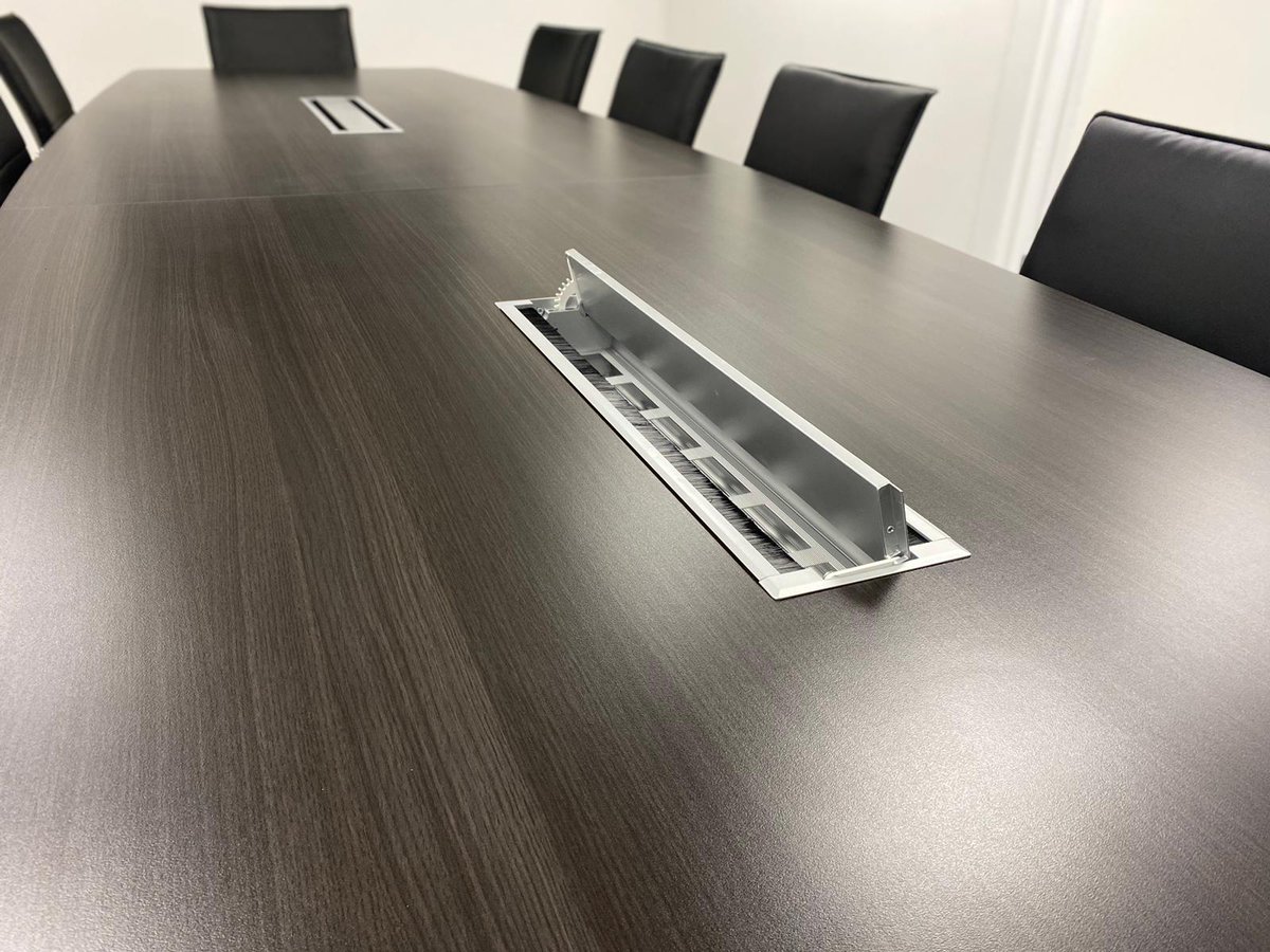 chrisbeon's tweet image. The team recently paid a visit to a #Walsallbusiness to complete a boardroom installation.
Traditional colours with #modernfittings - flip-up power #datamodules built into the #tabletop to allow those in meetings to easily plug into the modules without extension leads.