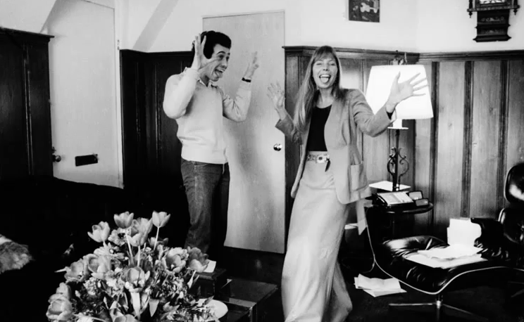 jonimitchell's tweet photo. “I was a free man in Paris
I felt unfettered and alive”

Feelin’ free with David Geffen on January 30, 1973. Photo by Julian Wasser. https://t.co/WH9MKjM8oL