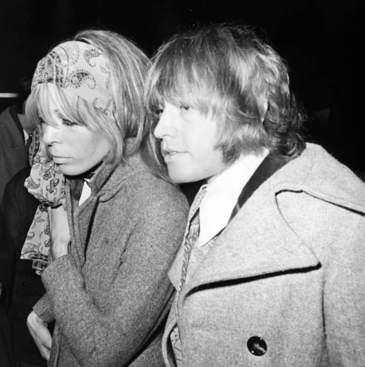 BrianResource's tweet photo. #BrianJones of #TheRollingStones & #SukiPotier, wearing #OssieClark tweed coats - European Premiere of "Candy" at The Odeon, #Kensington, #London - 20th February 1969. https://t.co/H3xCh7Ynii