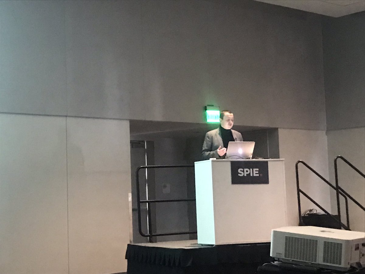 Happening right now @PhotonicsWest: @WimBogaerts of @PhotonicsUGent is delivering his invited talk on scaling of programmable silicon photonic circuits. @imec_int
