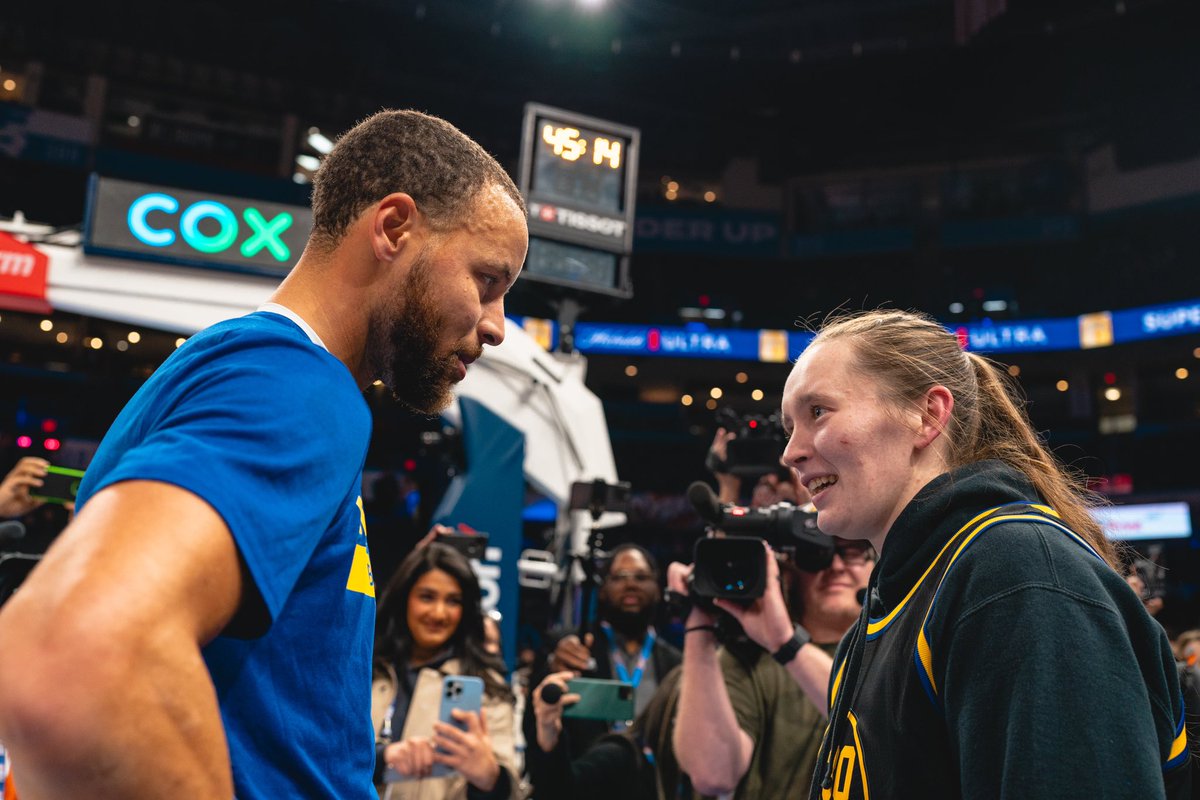 Oklahoma women’s basketball player Taylor Robertson meets Stephen Curry of the Golden State Warriors at the Paycom Center in Oklahoma City.