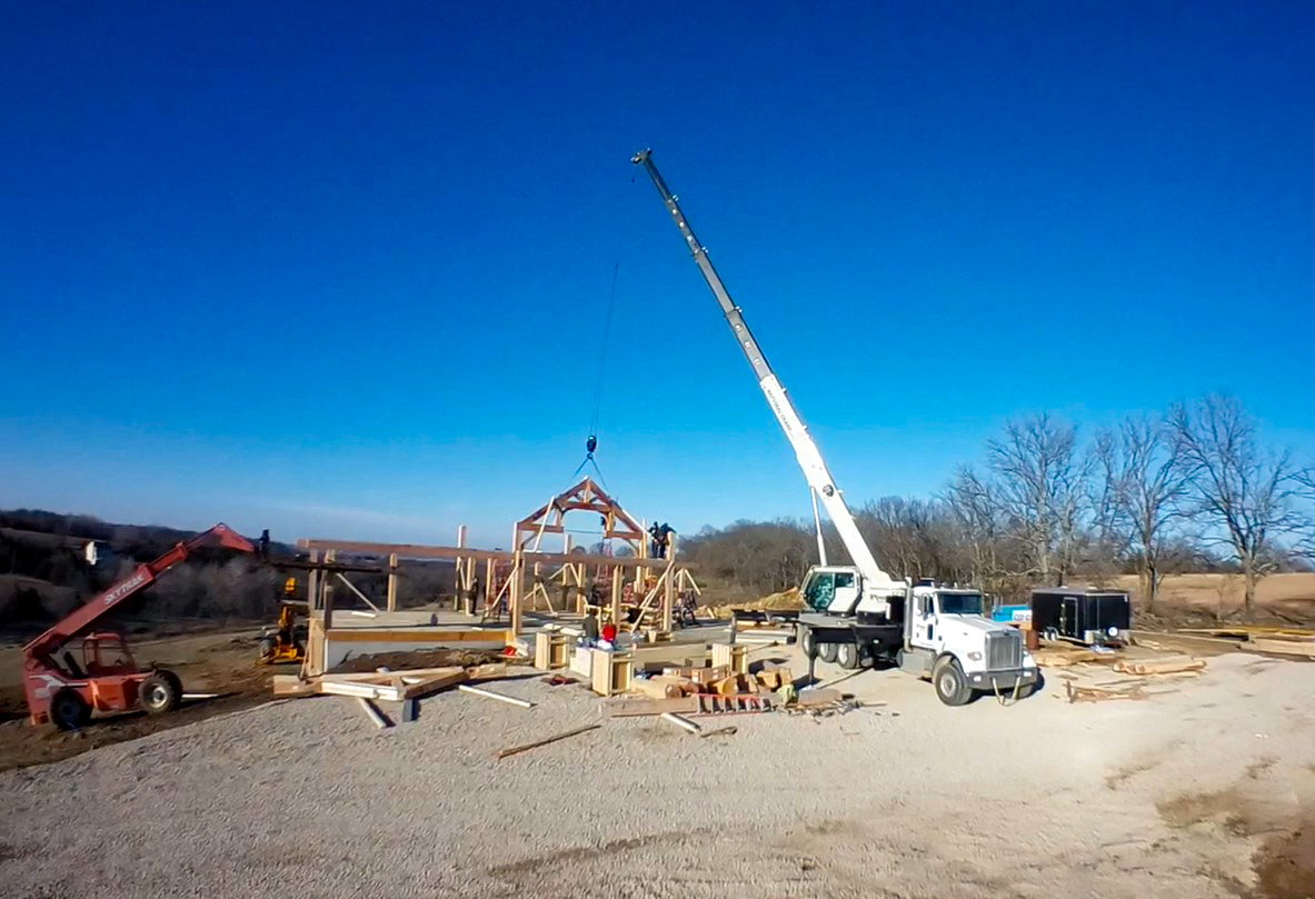 BCLogHomes's tweet photo. A great shot of the crane setting the queen post truss for a beautiful log and timber frame home we built for a great customer in Kansas!
#timberframe #loghomes #timberframehomes #loghomebuilders #westernredcedar #postandbeam #queentruss #innerkneebraces #beautifulhomes https://t.co/SFK1rCCCWP
