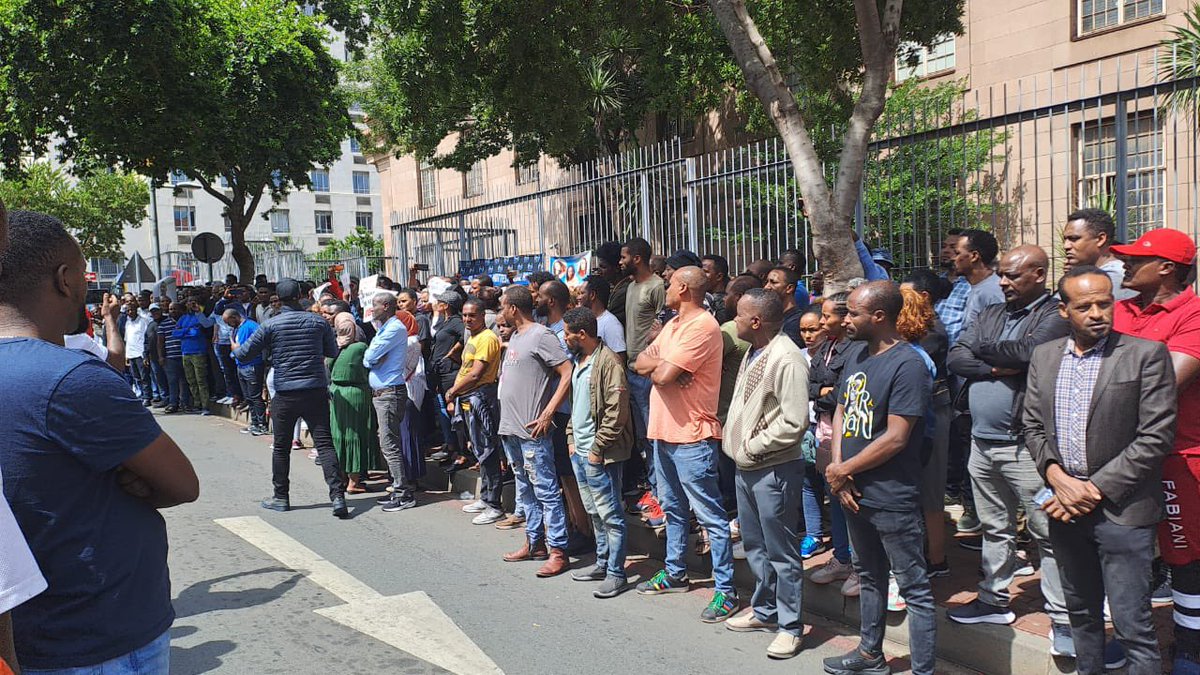 Abramjee's tweet photo. Ethiopian community protesting outside the JHB Magistrates Court  where kidnapping suspects are applying for bail. https://t.co/2Z6woPostl