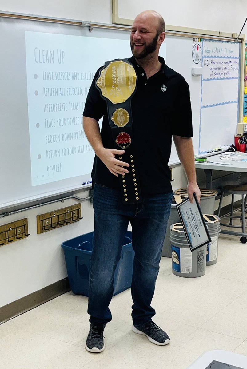 Congrats to Michael Richwalder, STEAM Teacher @EasleyYrElem, our @DurhamPublicSch January 2023 Equity Champion of the Month! In addition to his Equity Championship belt and certificate, Mr. Richwalder will receive a gift card to @rofhiwabooks courtesy of @weare_org #WeAreDPS