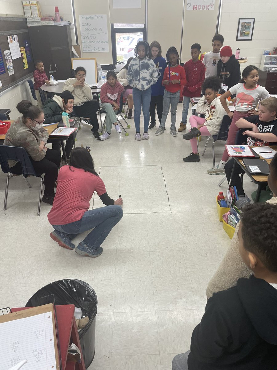 Mrs. B using a more concrete model to talk about fractions!