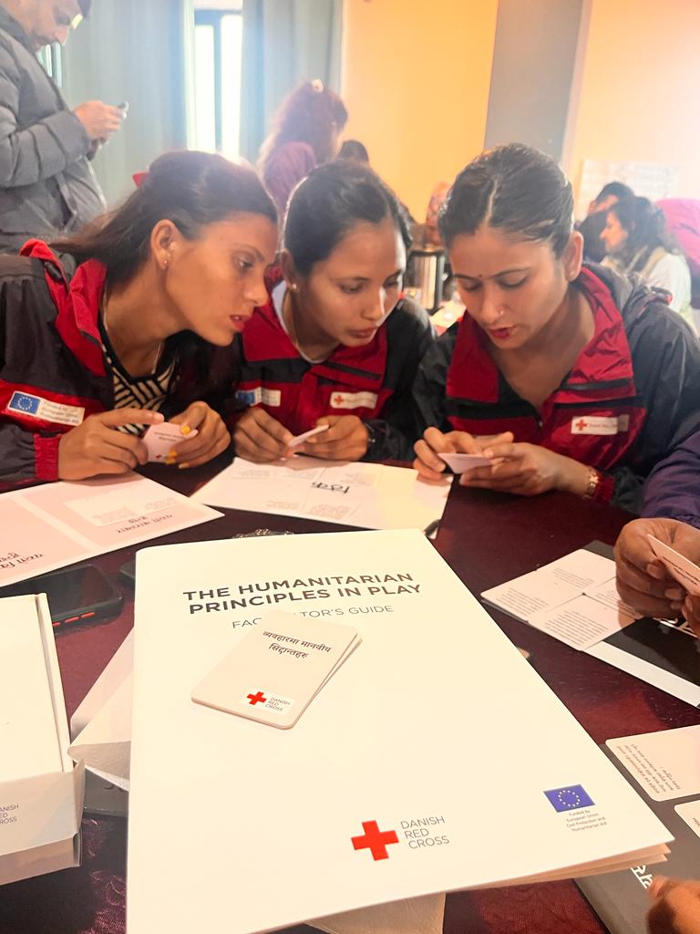 tmarki's tweet photo. We @DanskRodeKors are using a card game called "Humanitarian Principles at play" to introduce new staff @NepalRedCross to the #humanitarian principles.
This game was produced under one of our previous projects in Nepal funded by #EUaid. https://t.co/bqkAkiAS3c