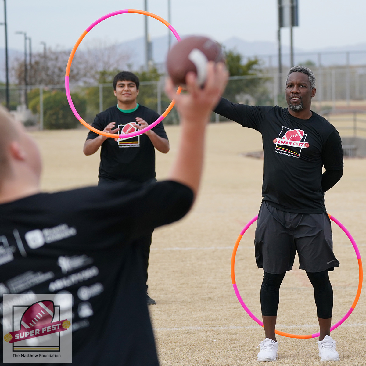 thematthewfdn's tweet photo. @StanfordFball alums @gmilburn and Luke Powell coach up players of all abilities and disabilities at #SuperFest2023 during #SuperBowl Saturday. #SuperBowlSunday #SBLVII #SuperBowlLVII  #NFL  #Football #downsyndrome #autism #disability  #inclusion #inclusive #stanford #Pac12 https://t.co/BHTORfs6WI