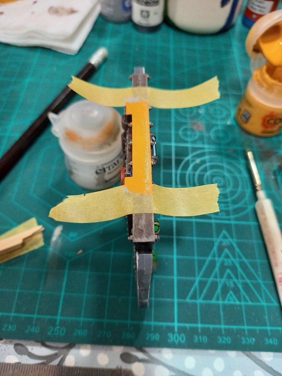 PlasticRapt's tweet photo. 3. Paint the area yellow. I used GW's Averland Sunset.
4. Mark out the lines. I used a piece of 1cm x 1cm square dowel and marked the lines in pencil.
5. Paint alternating areas black. I used Vallejo's Black Grey. 
6. Peel off the masking tape. #gallowdark #boardingactions #40k https://t.co/KEY1Uqu2oS