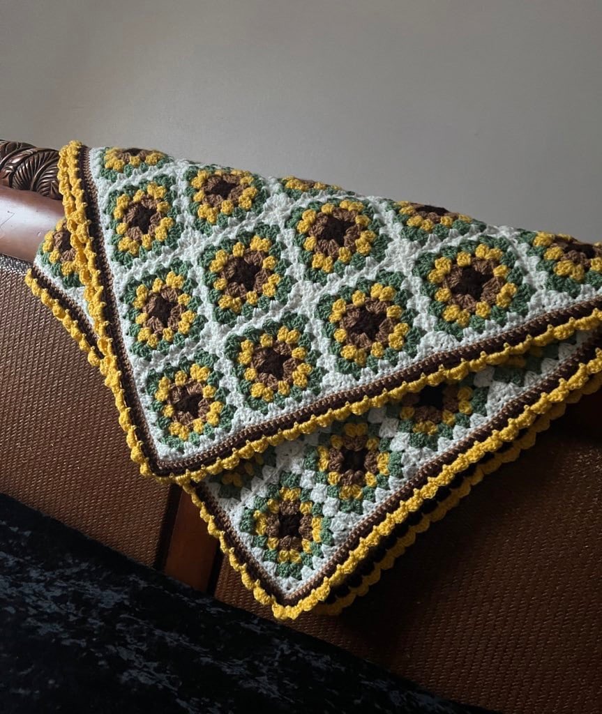 Handmade Crochet Sunflower Blanket Crochet Gift #yellow #green #crochetsunflower #crochetflowerthrow #crochetsunflowers #handmade #crochet #sunflowerblanket #sunflowers #bedthrow #bedding #MHHSBD #handmadegift #shopindie #wip  etsy.me/3XpMhU2