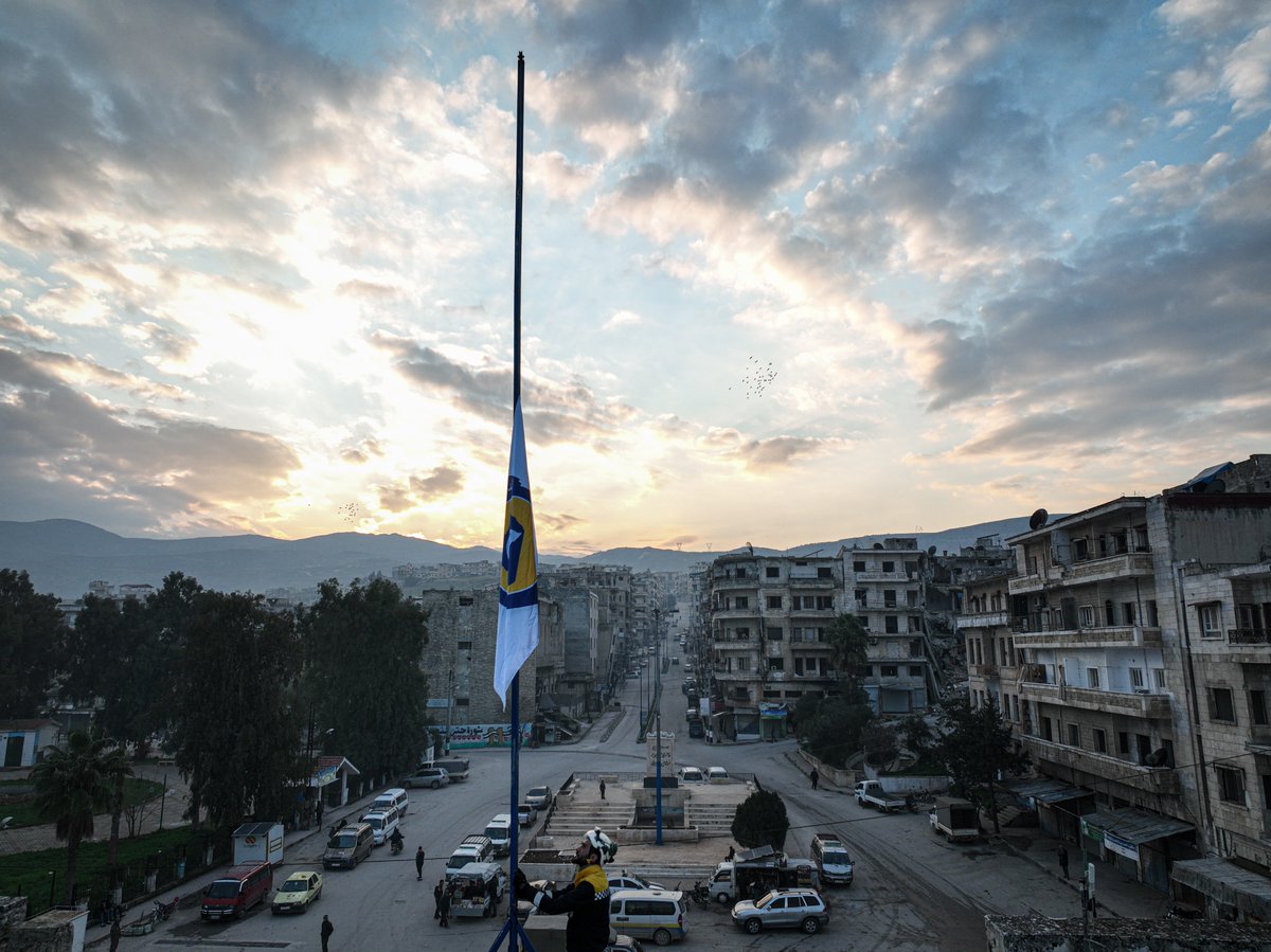 SyriaCivilDef's tweet photo. White Helmets announce official mourning throughout Syria. We will fly flags at half mast for 7 days, starting today, Feb 13 to mourn the victims of the #earthquake in #Syria &amp; #Turkey. We declare Feb 6 an annual national day of mourning to commemorate the memory of the victims. https://t.co/W4WOMvOwqd