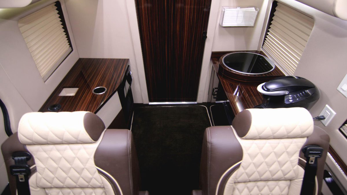 HQCustomDesign's tweet photo. Road trips just got a major upgrade! This RV Camper is packed with luxury features - kitchenette, rear bathroom, comfy captain chairs, removable table, 32" LED TV w/ surround sound &amp; Apple TV. 
https://t.co/zO4zXmStGf
.
.
#HQCustomDesign #mercedesbenz #sprintervan https://t.co/0iH7dJOyX5