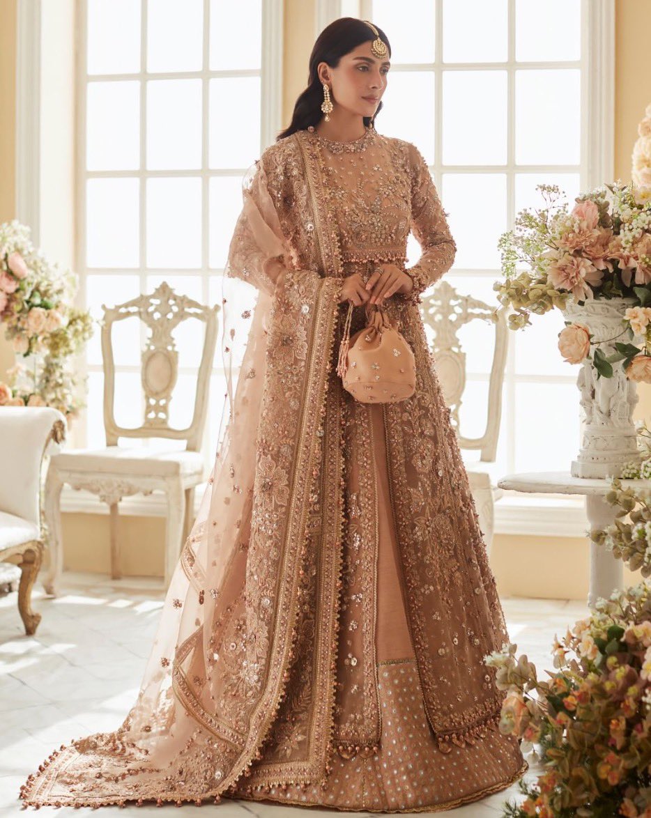 elantweets's tweet photo. Pakistan’s favourite actress, @Ayezakhanak3, steps in the world of glamour with ‘Ariana’ - a stunning design from Élan’s new wedding festive collection.  
Laden with iridescent embellishments, this masterpiece exudes a timeless charm that’s sure to turn heads. https://t.co/zg2s9Qy9oJ