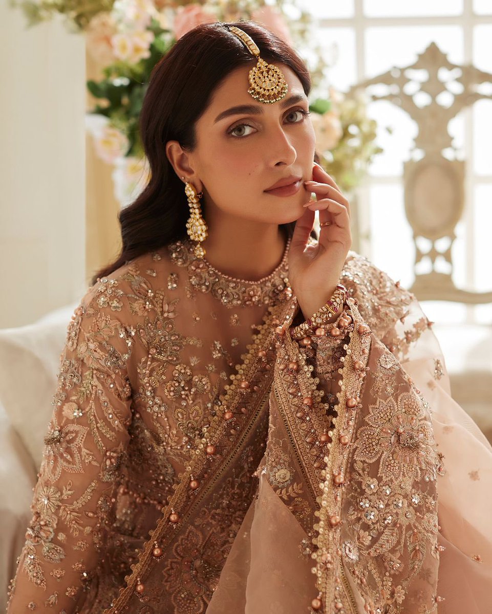 elantweets's tweet photo. Pakistan’s favourite actress, @Ayezakhanak3, steps in the world of glamour with ‘Ariana’ - a stunning design from Élan’s new wedding festive collection.  
Laden with iridescent embellishments, this masterpiece exudes a timeless charm that’s sure to turn heads. https://t.co/zg2s9Qy9oJ