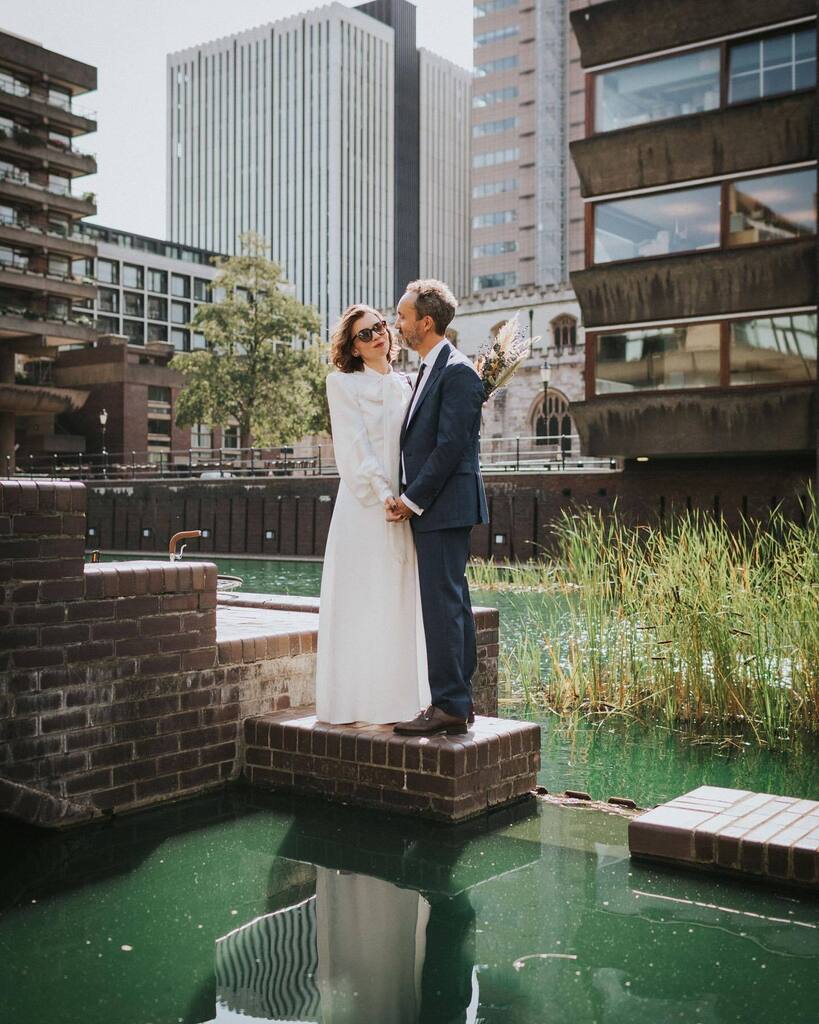 Graciene+Vincent’s wedding portraits at <a href="/barbicancentre/">Barbican Centre</a> - London Elopements. 🖤🧡 
Let’s get married and stroll the city! 
.
.
.
.
#london #wedding #alternativebride #alternativeweddingphotographer #portraitcollective #weheartpictures #thatsdarling #lo… instagr.am/p/Coms5o5MBcc/