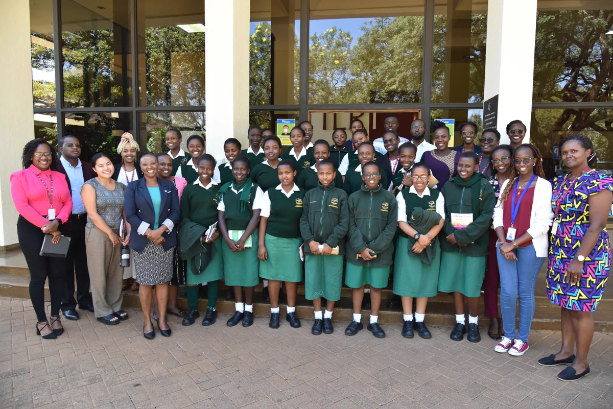 Precious Blood girls at ILRI with some of the ILRI scientists