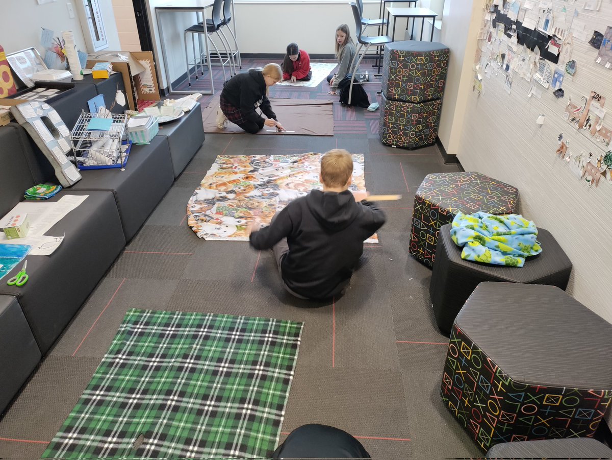 SpanglerCCLS's tweet photo. 7th grade class service project. Making tied fleece blankets to donate to St. Louis Children's Hospital. @CCLSChargers https://t.co/NpriqbSM7E