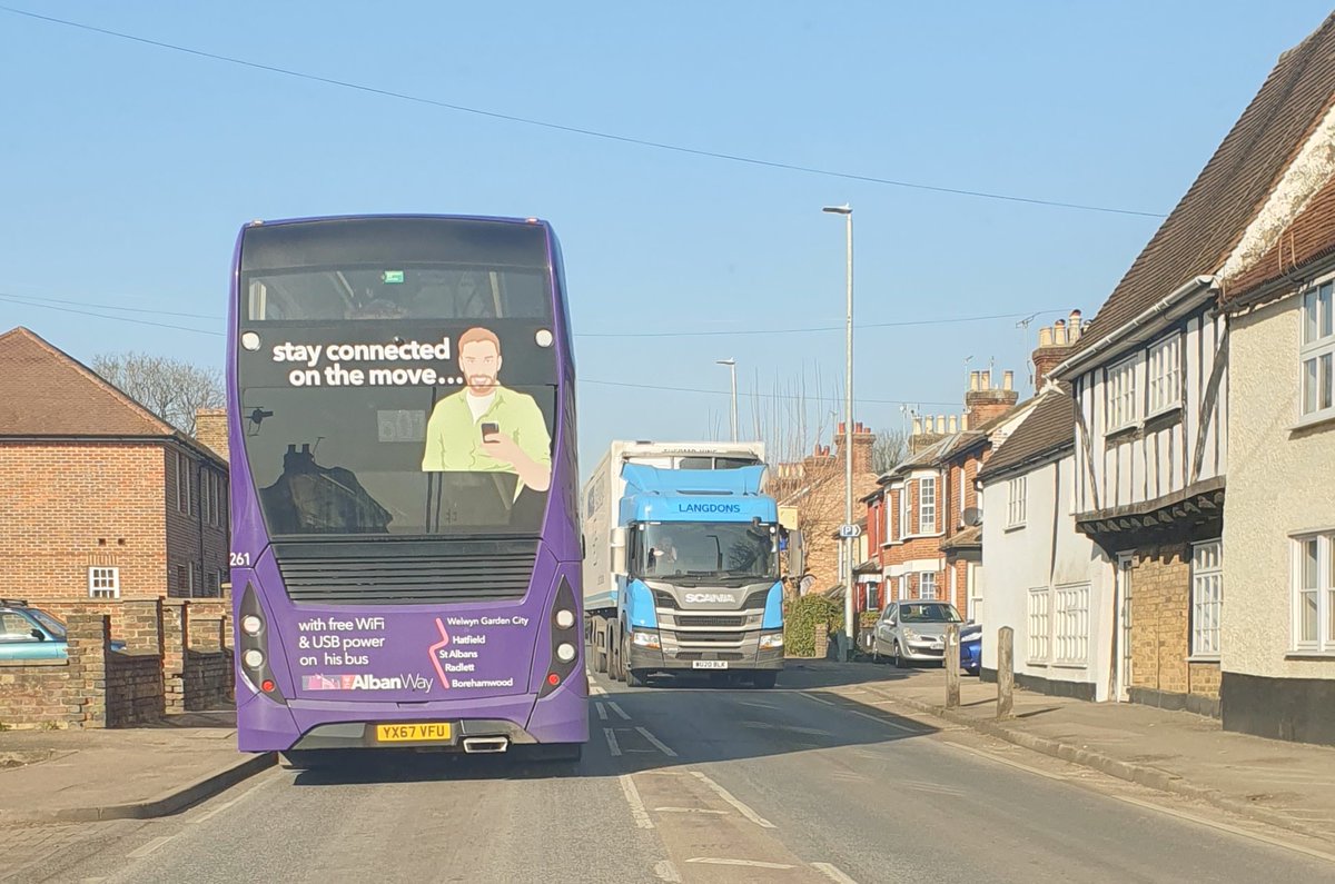 Daffers16's tweet photo. @SaveStAlbansftf @hertscc @CPREHerts No direct access to motorway=even more in photo! #tailbacks No getting down potholed Watling Street as #HGV thundering down... #Tudor homes #polluted. Bus/traffic had to wait - too narrow to pass. Multiply that 3000 pd ....π THIS IS NOT a MOTORWAY! Bypass...what bypass??! https://t.co/UJZInHYN1o